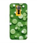 Printed Mobile Back Covers for Tecno Phantom X close up green background with white polka dots
